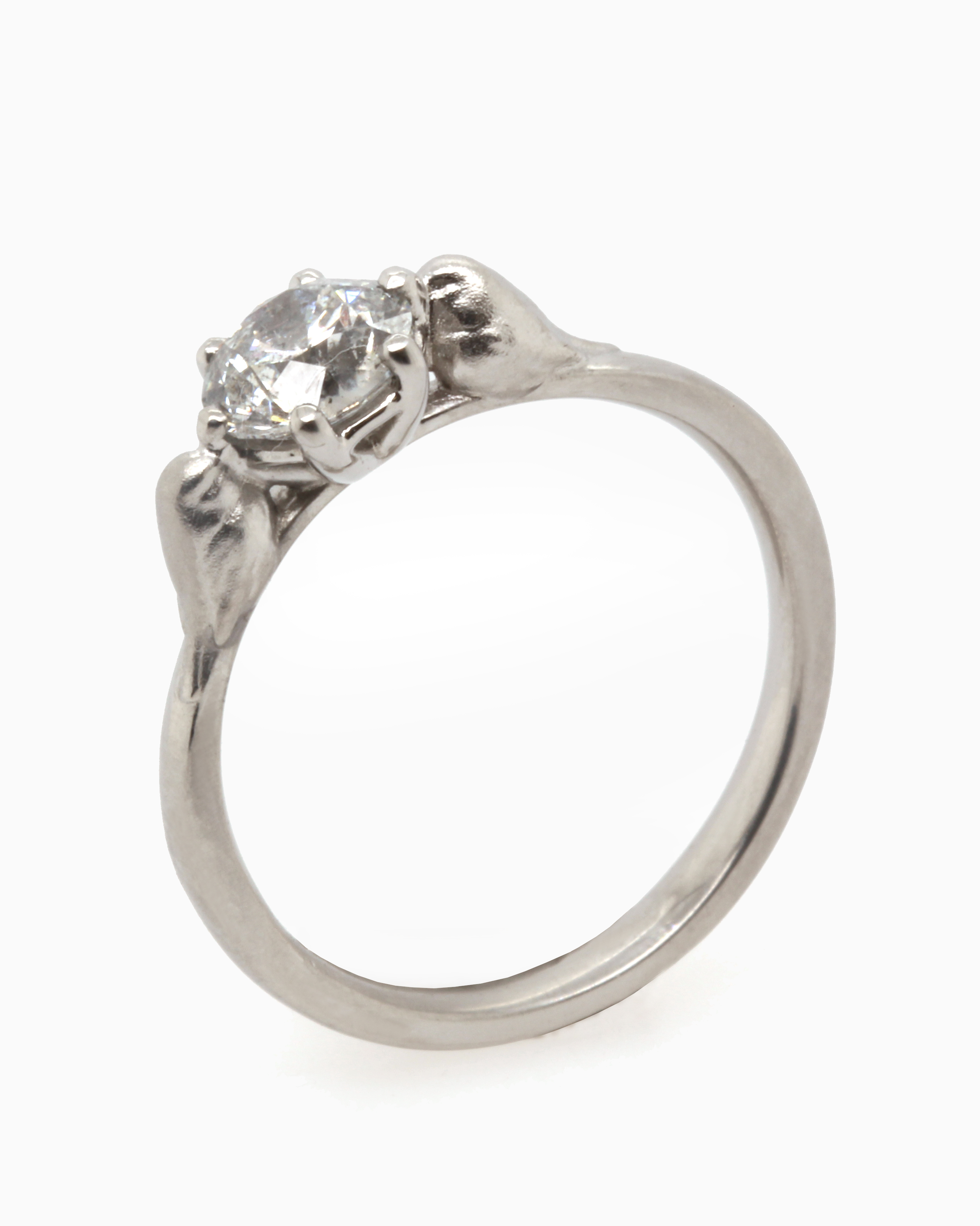 platinum engagement ring set with a diamond