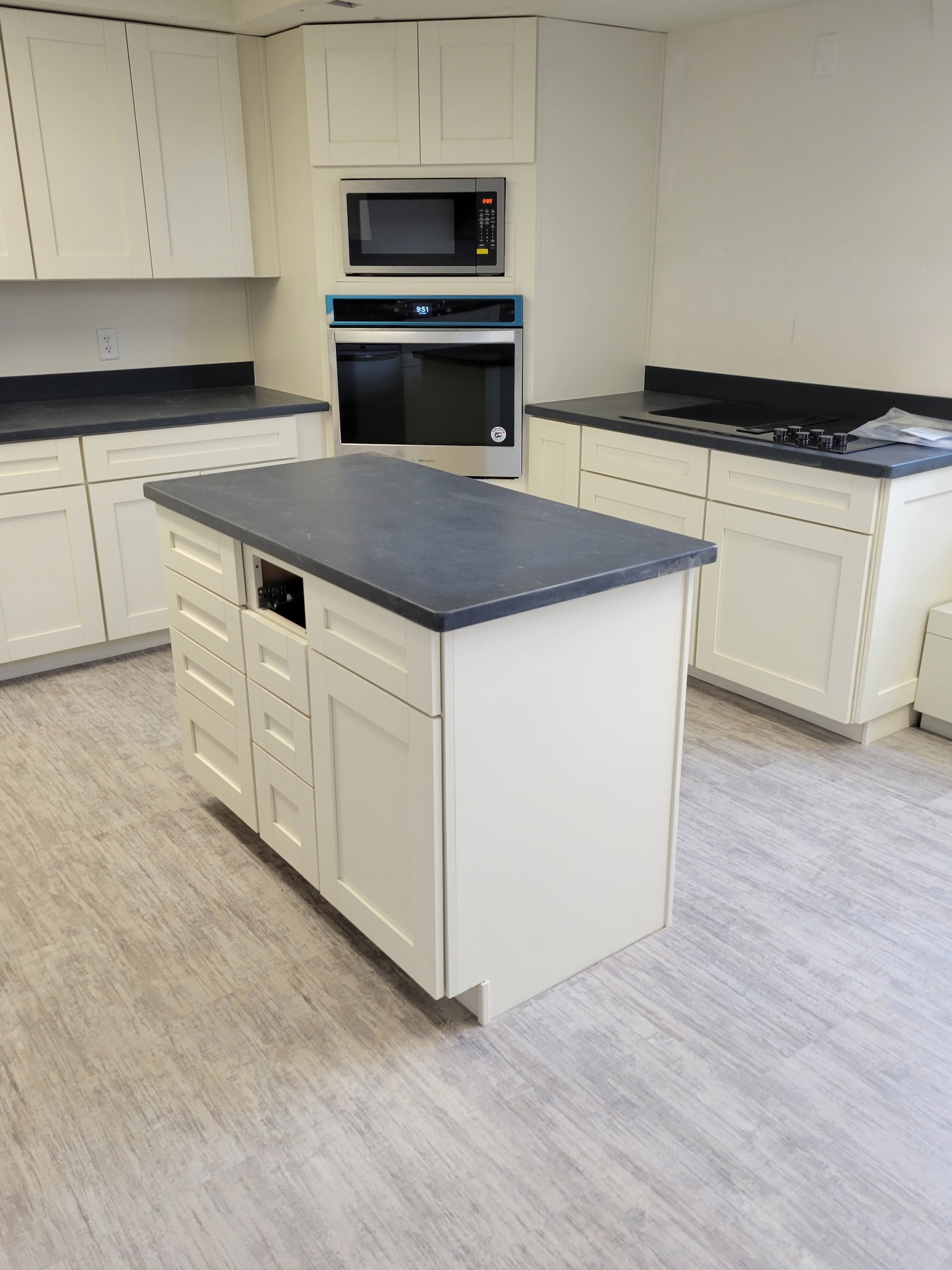 Modern living room with open kitchen and minimalist decor