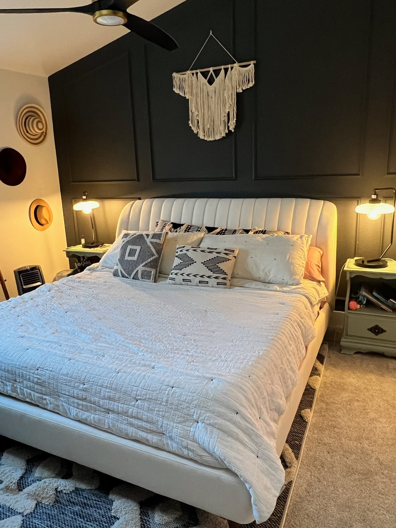a large kitchen with a center island in the middle of the room
