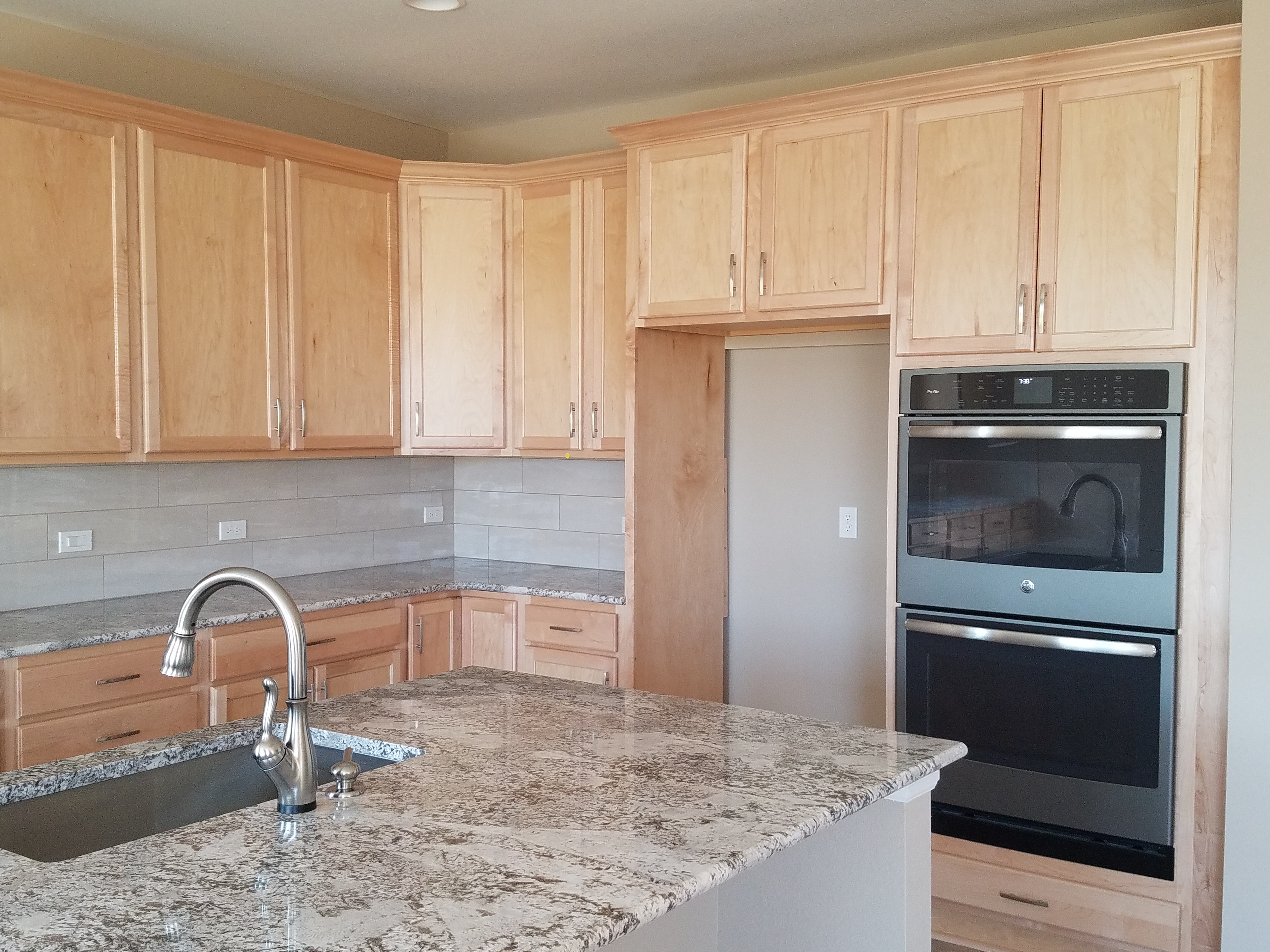 Modern living room with open kitchen and minimalist decor