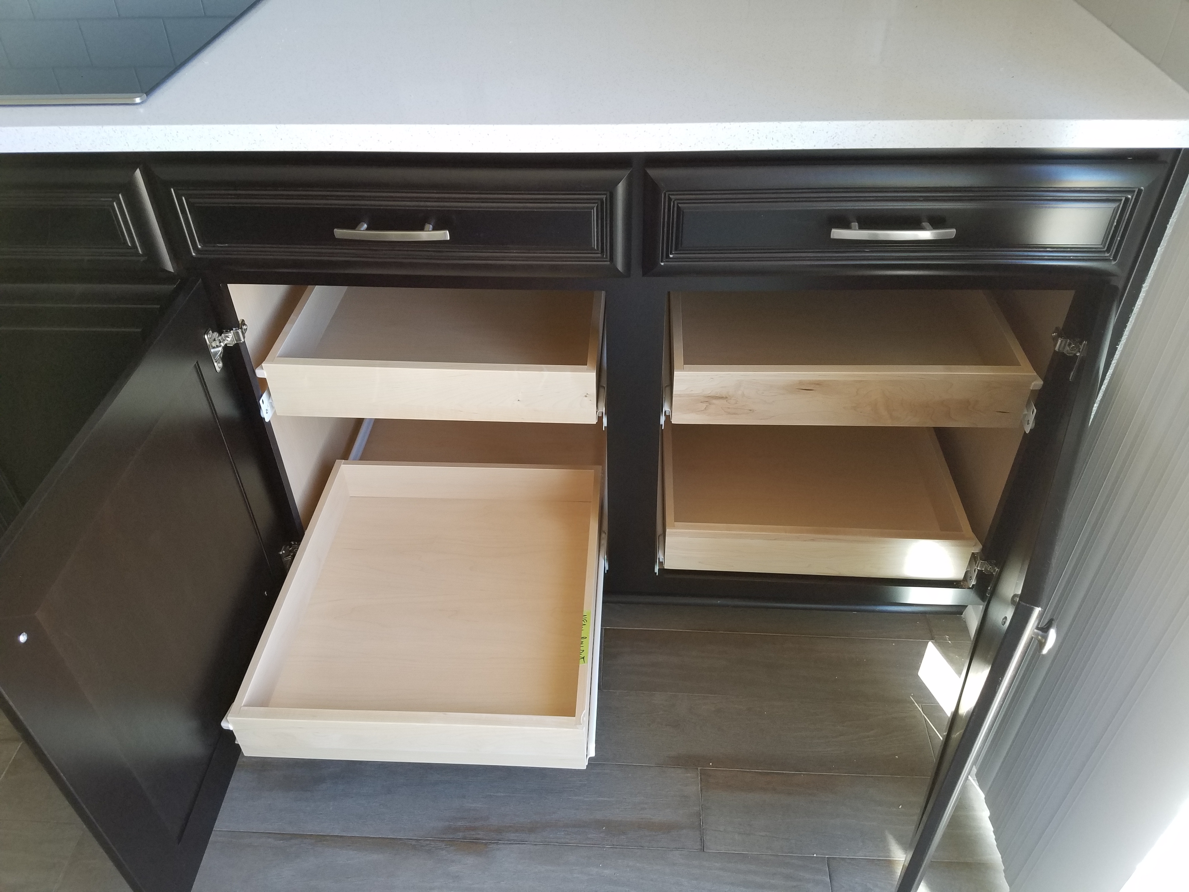 a kitchen with white cabinets