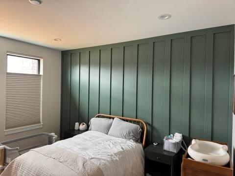 a large kitchen with a center island in the middle of the room
