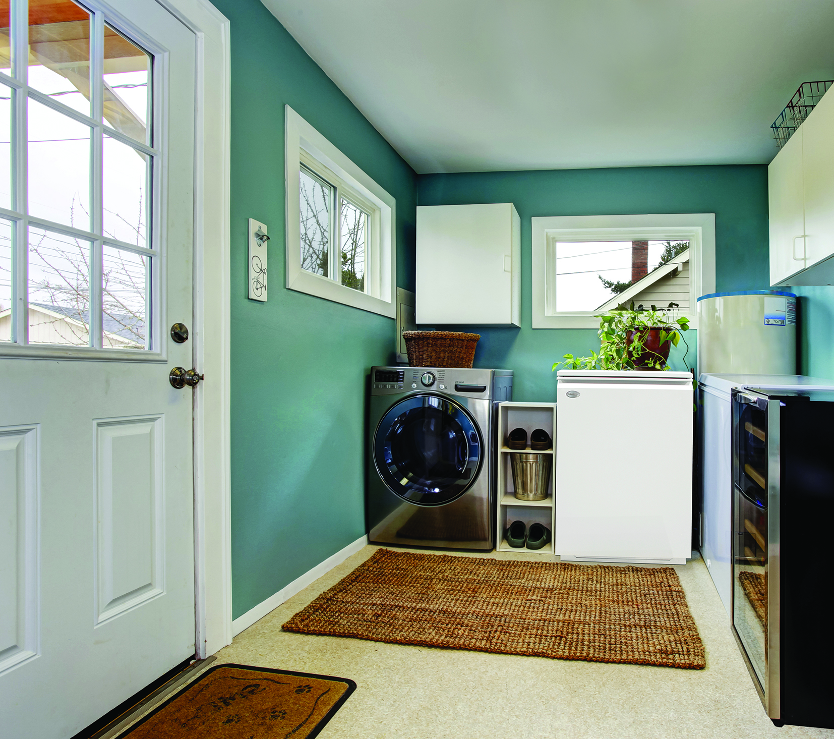 a room with a stove and a chair in it