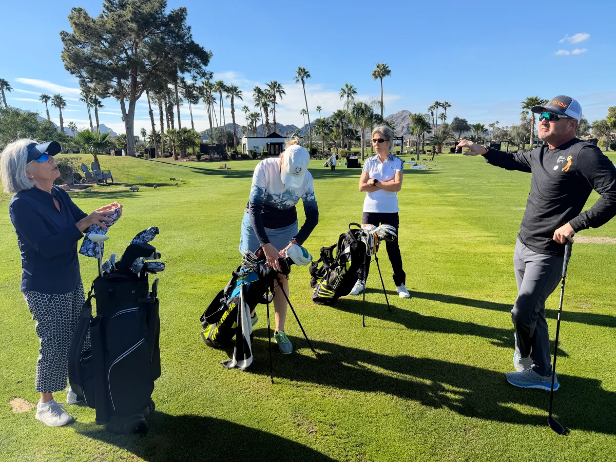 Coach Erik giving instructions at the beginning of a group lesson
