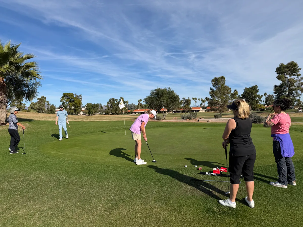 Women Playing Putting Game