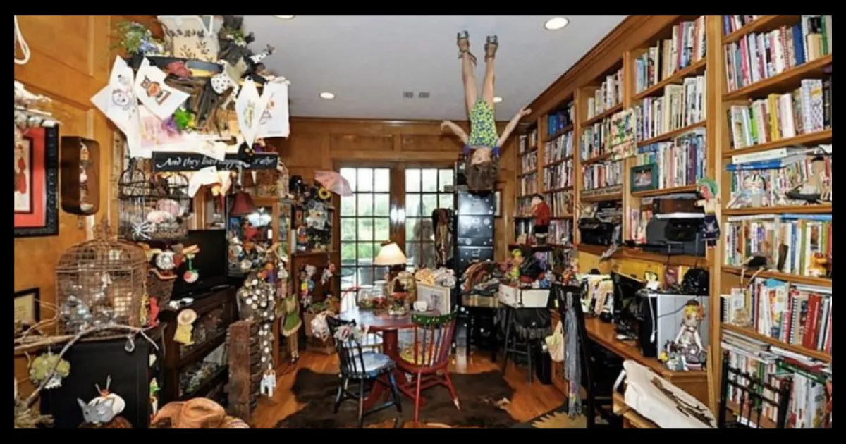 room with books furniture toys papers everywhere cluttered