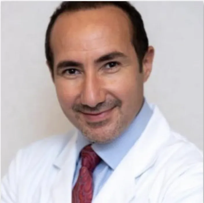 Implant-supported dentures Beverly Hills MI | Close-up of flexible overdenture fittings / Dr. Rita Bano | Advanced Dentistry Center