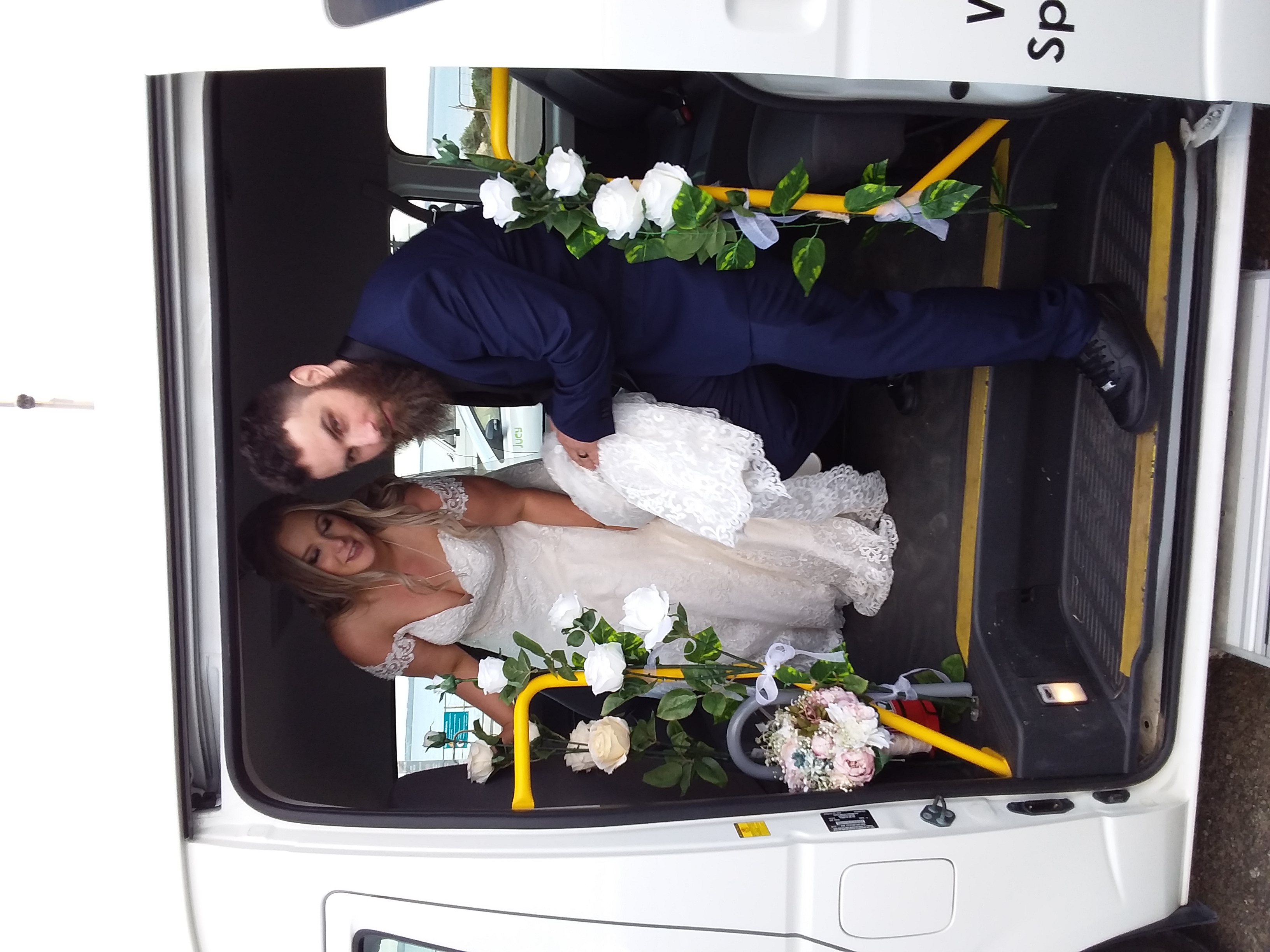 Elegantly decorated minibus and wedding guests on Kangaroo Island