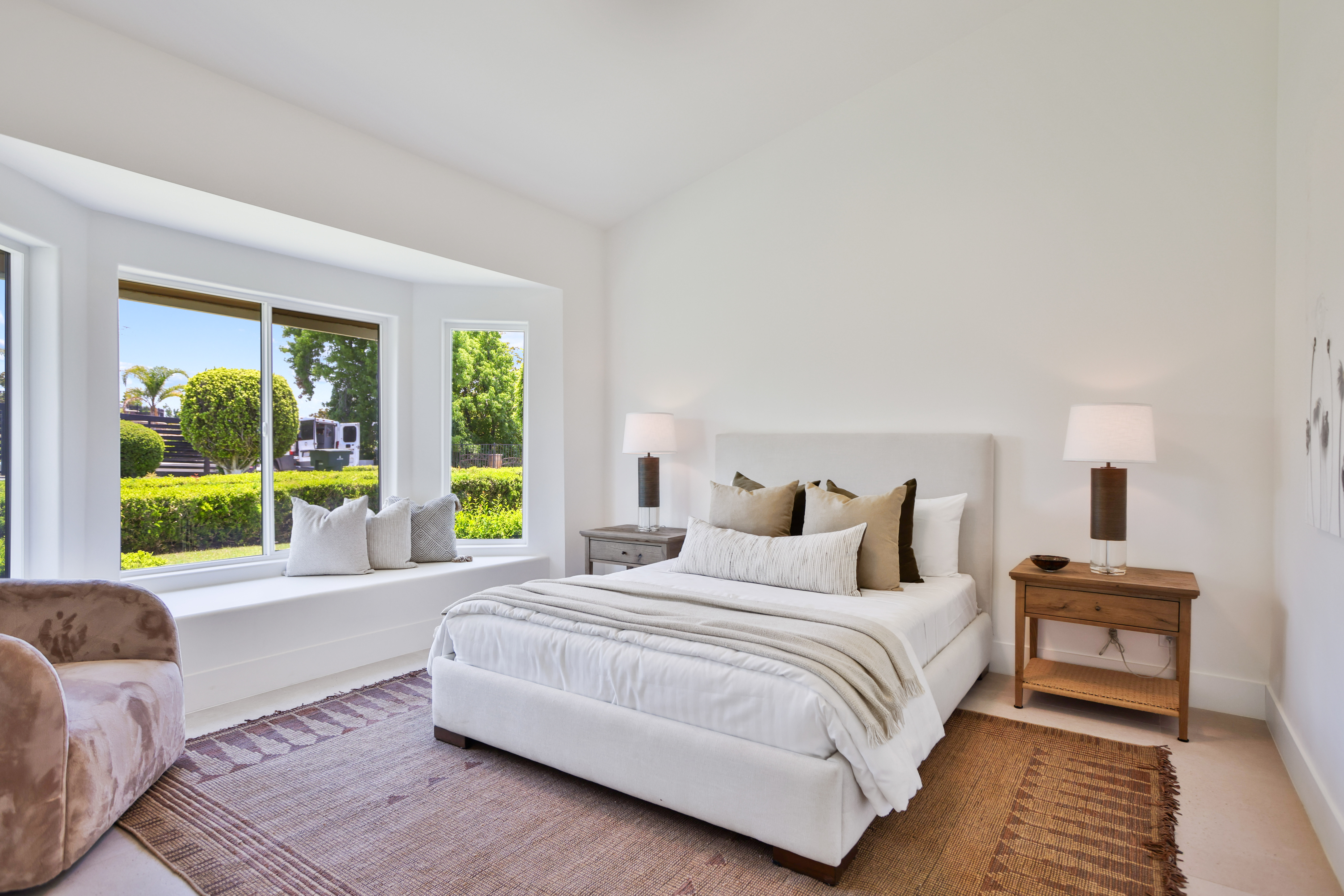 person in blue jacket holding black dslr camera