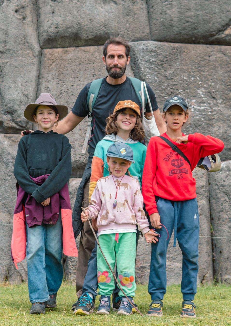 Rodrigo with worldschooling students at an Inca site near Cusco