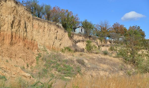 Steep hillside with erosion showing the challenges of building an ADU on a sloped or cliff-side lot