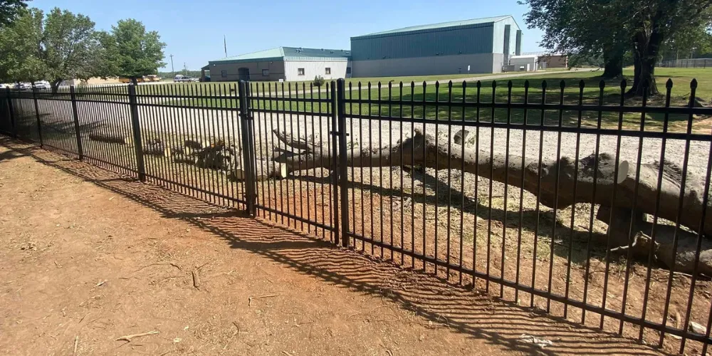 Ornamental iron fence installation