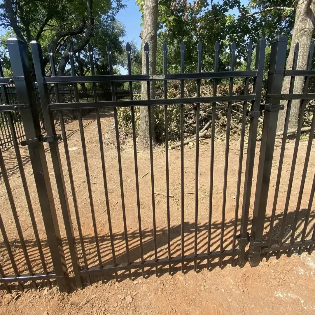 Wood privacy fence installation detail in Sapulpa, OK