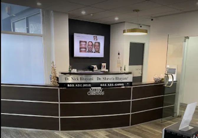 person with silver teeth braces