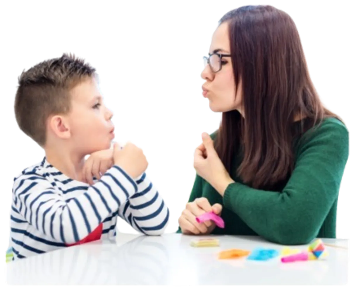 two little girls laying on the floor next to a christmas tree