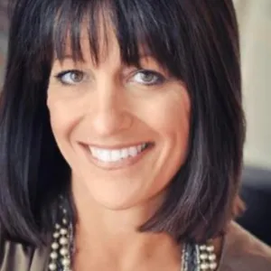 Corinne W.
