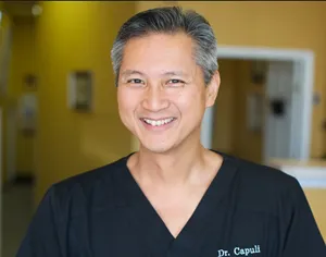 Dr. , chiropractor at Capuli Chiropractic in Pantego, TX