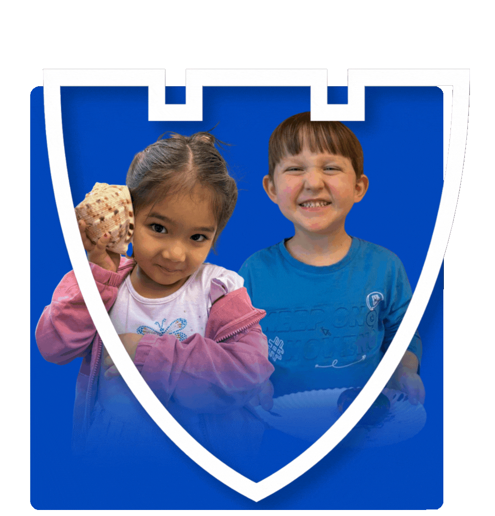 boy and girl smiling at daycare center