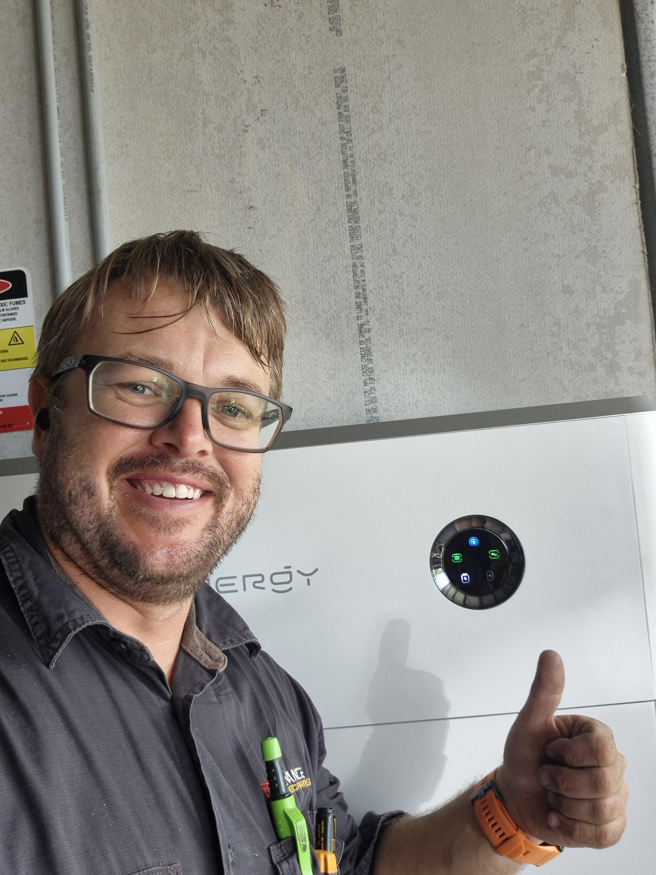 Chris with a solar battery install