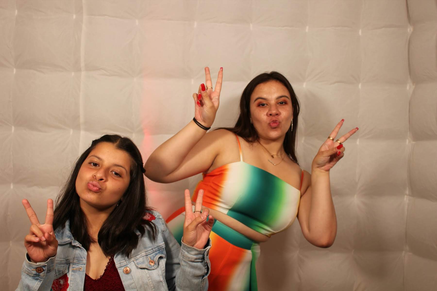 Orange County party guests posing at interactive event photo booth