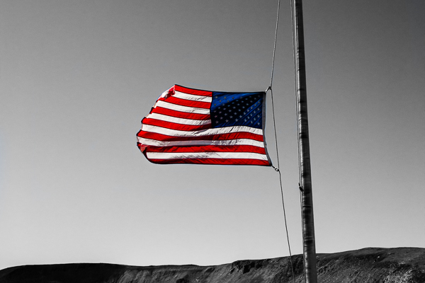 American flag flying at Rocky Mountain National Park, Colorado, at half staff in honor of Senator John McCann's passing