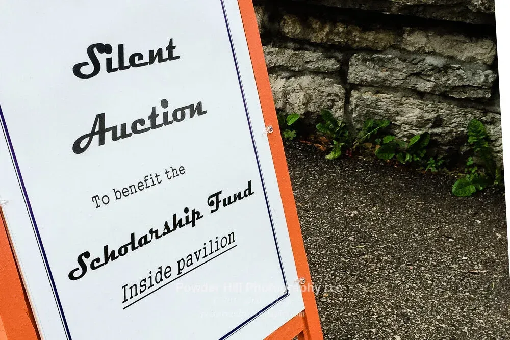 Image of sign promoting the art fair's Silent Auction