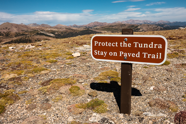 Sign on the top of a mountain in the alpine tundra, stating "Protect the Tundra", at Rocky Mountain National Park, Colorado