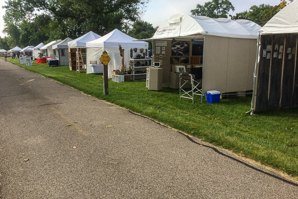 Art fair booths all set up along a sidwalk in Wisconsin