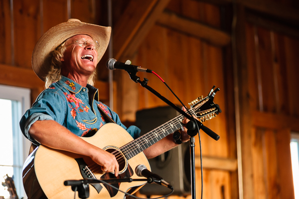 Cowboy Brad Fitch playing a John Denver tribute concert at Holy Hill Art Farm, Wisconsin