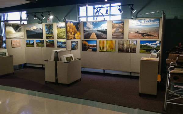 View of an art fair booth at an inside location