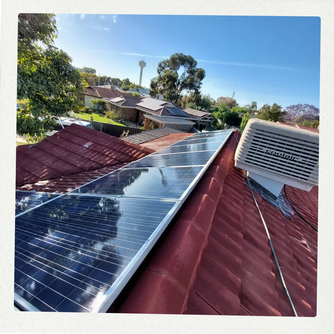 Clean solar panels on residential roof maximizing energy efficiency - Mike's Solar Panel Cleaning Mildura Sunraysia