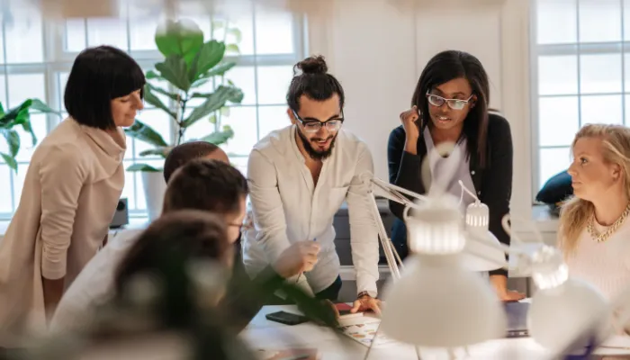 Person working on a laptop reviewing keyword and search performance data for SEO.