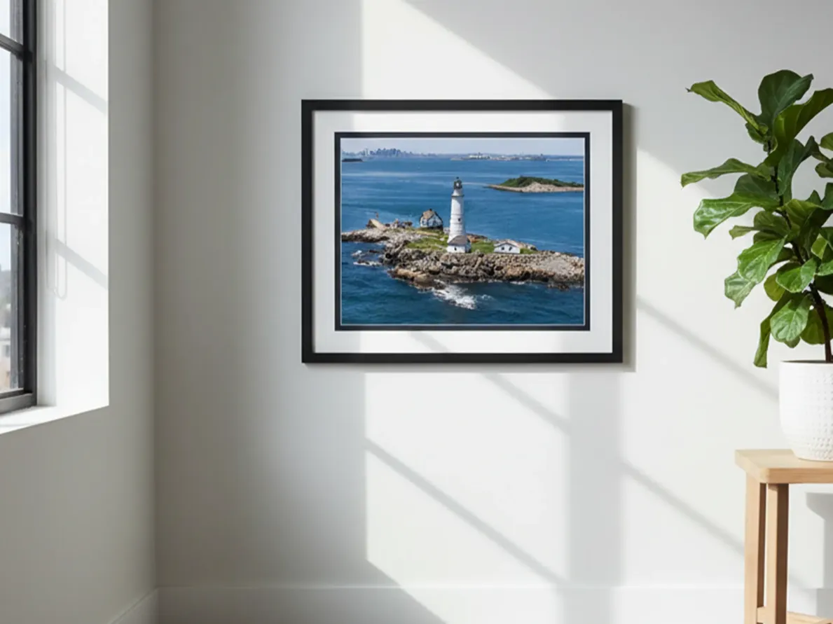 Custom framed lighthouse print displayed on wall by The Beacon Studio Winthrop MA