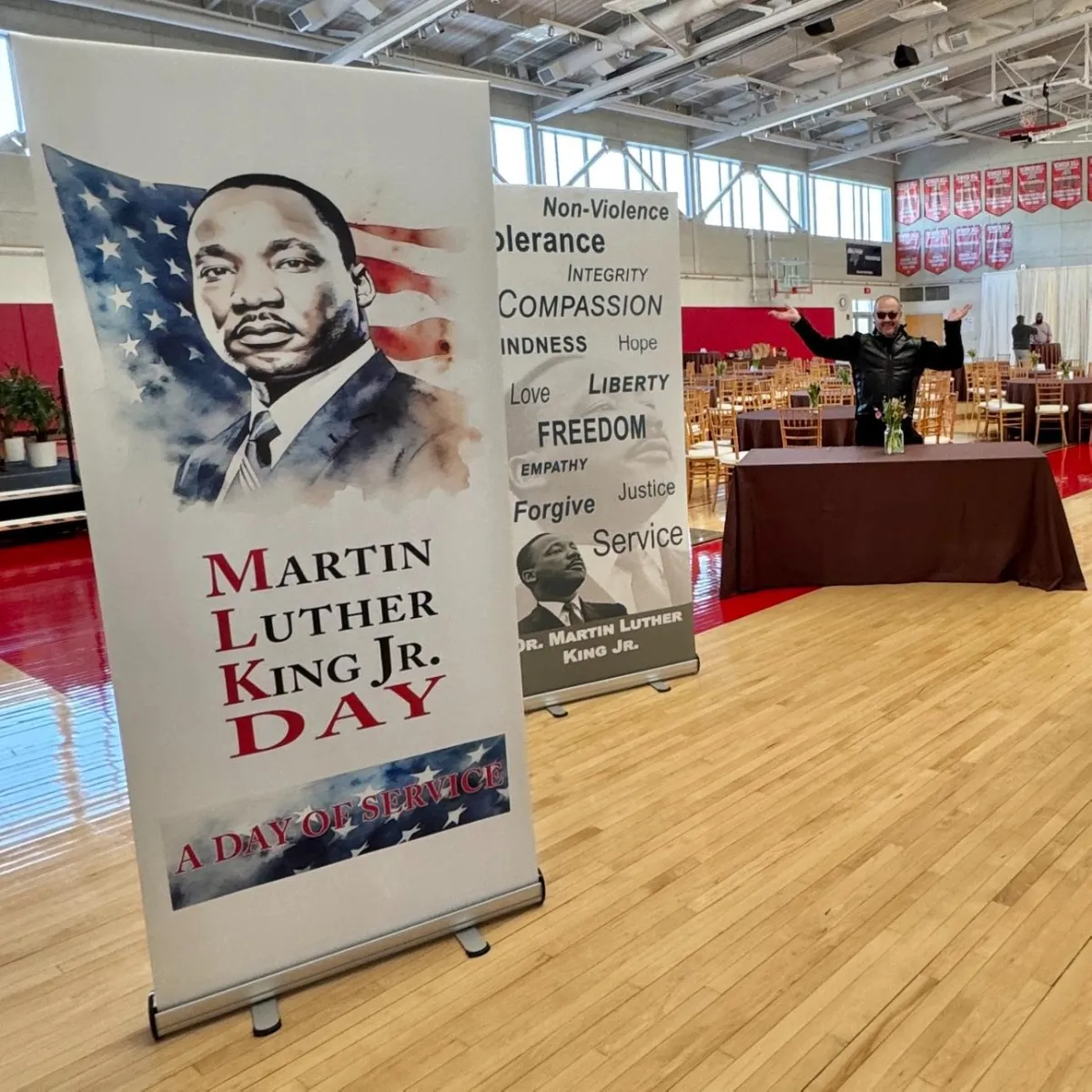 Large format printed event banner display inside community venue produced by The Beacon Studio