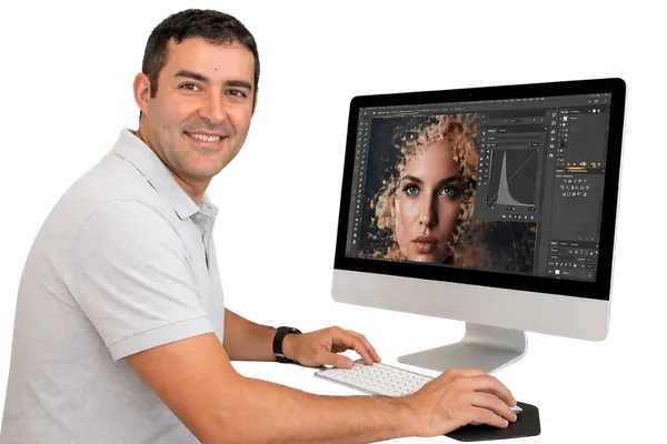 john munson the owner of The Beacon Studio in Boston editing a file on a computer for editing services