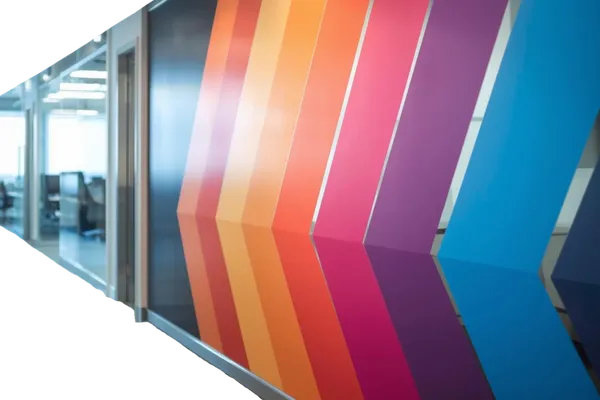 Printed window graphics with colorful branding design on glass wall