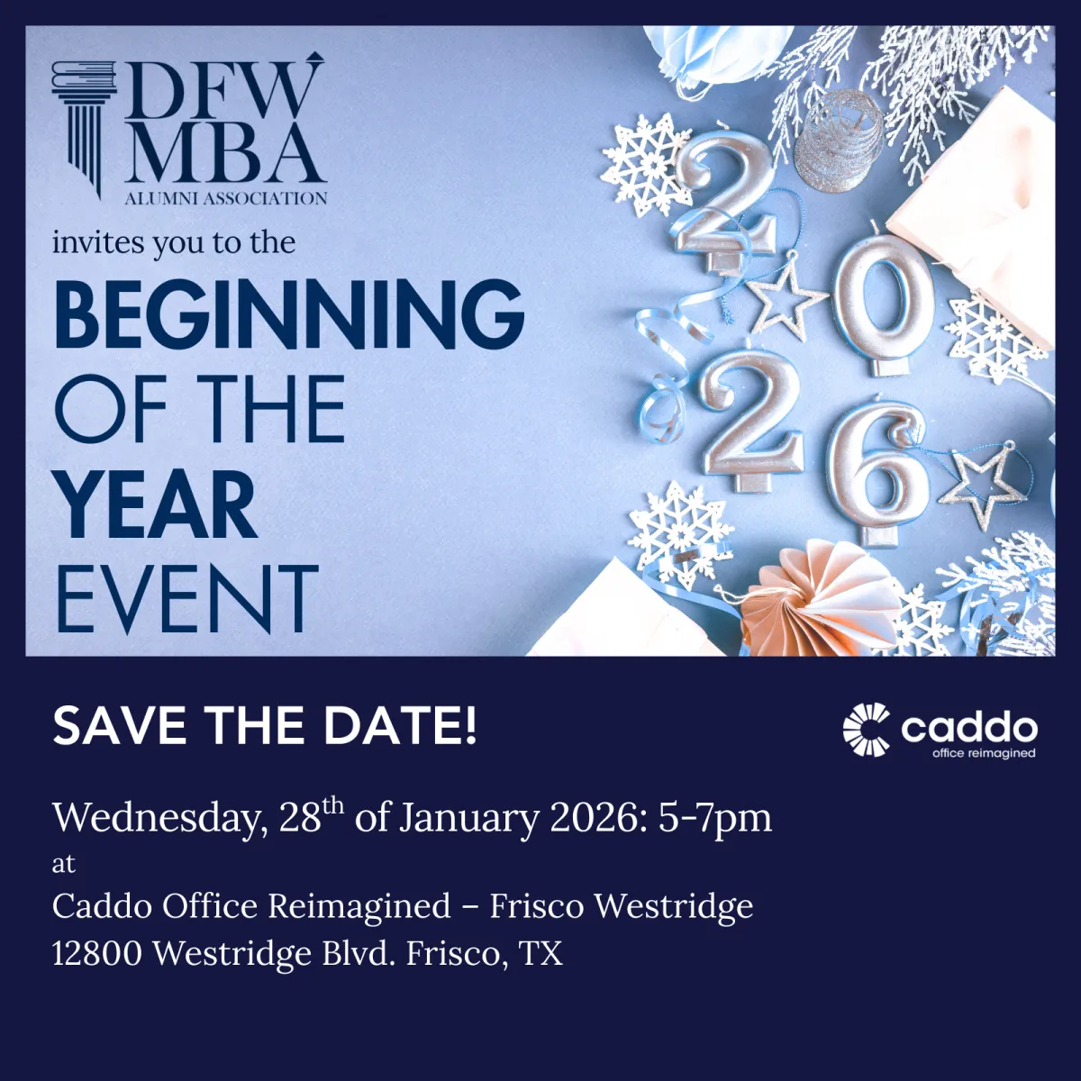 A candid photo of a bustling indoor event with people browsing art displays, vibrant banners overhead, and a stage in the background.