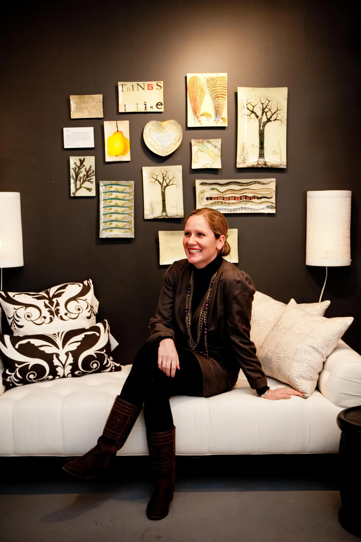 Boutique owner in Boston posing for a brand photo in her store