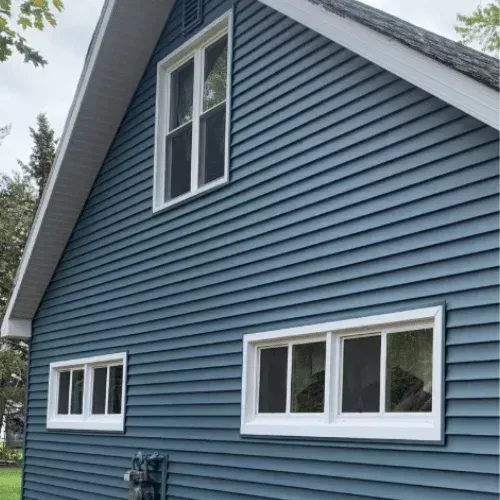 Cowboys Roofing and Exteriors completing roof repair in Calgary