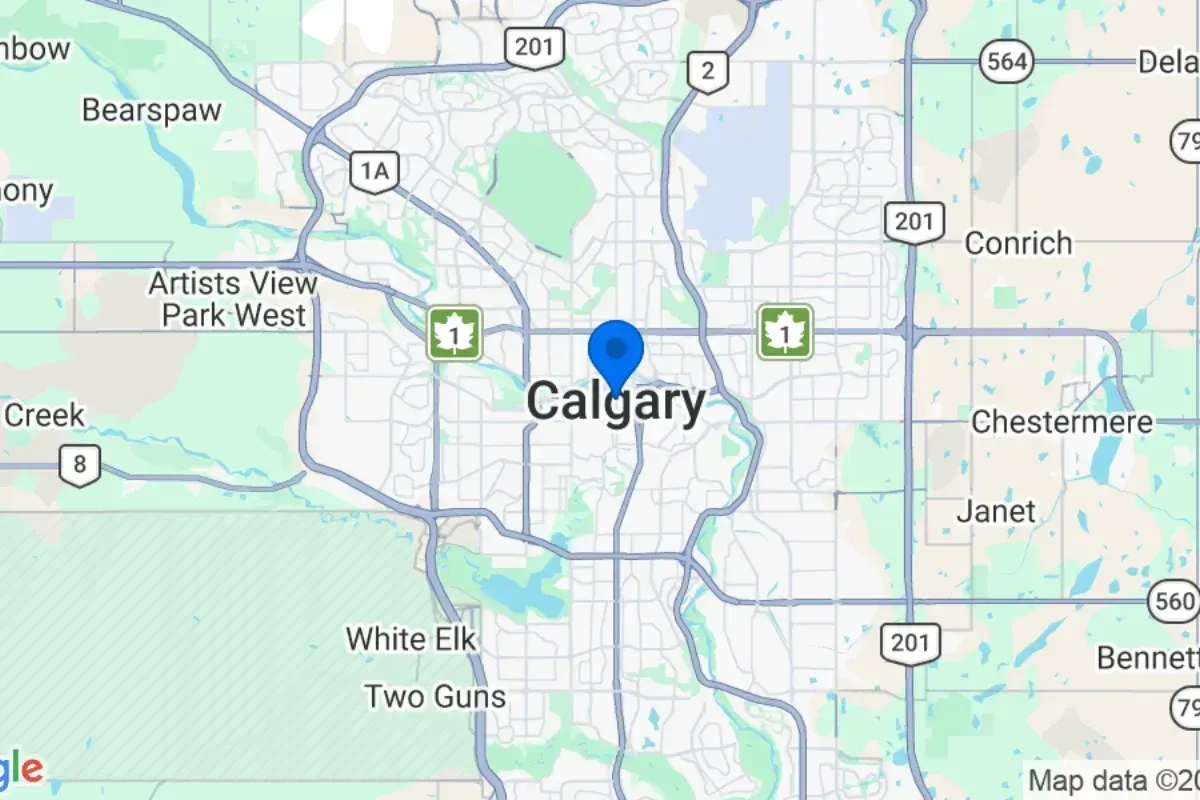 Cowboys Roofing service truck at roofing project in Calgary Alberta