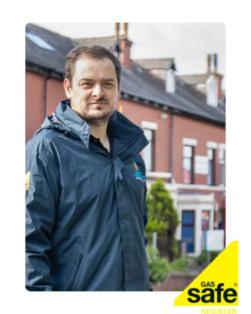 Business owner photo stood in the street with a gas safe logo at the bottom right