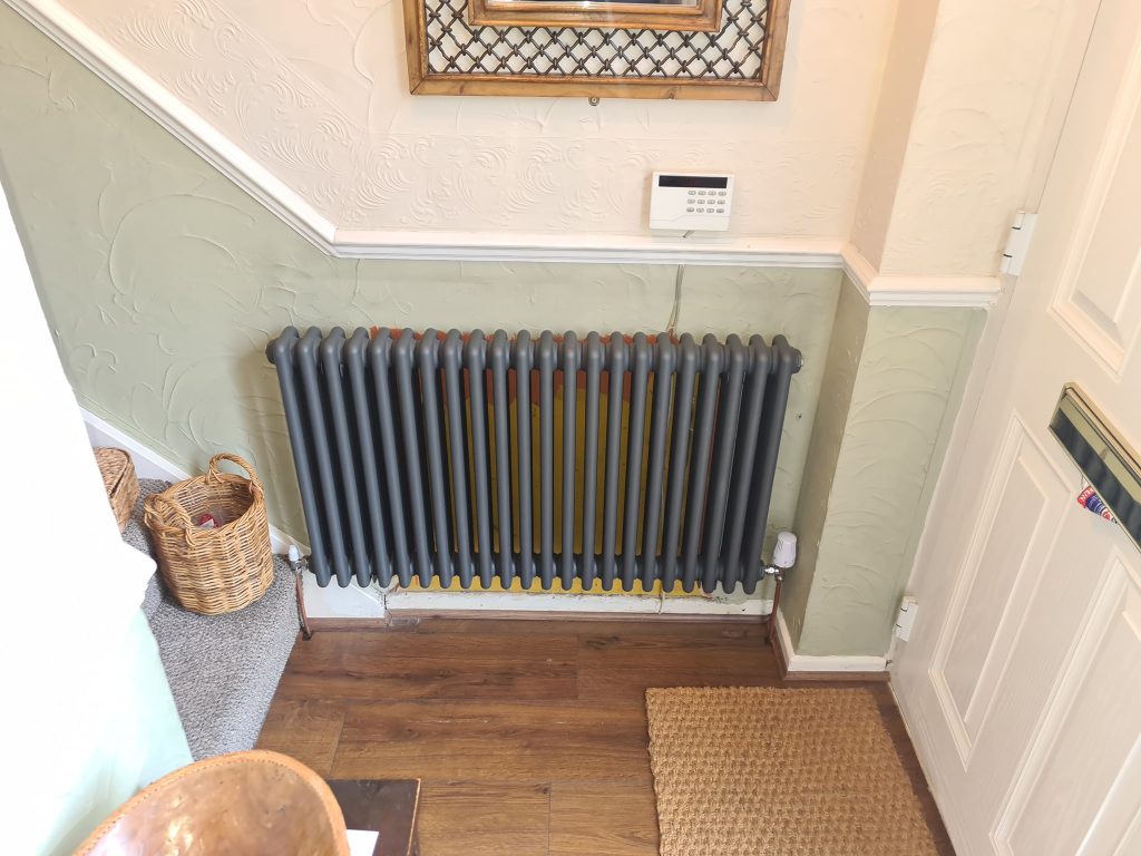 A grey old style cast icon modern radiator