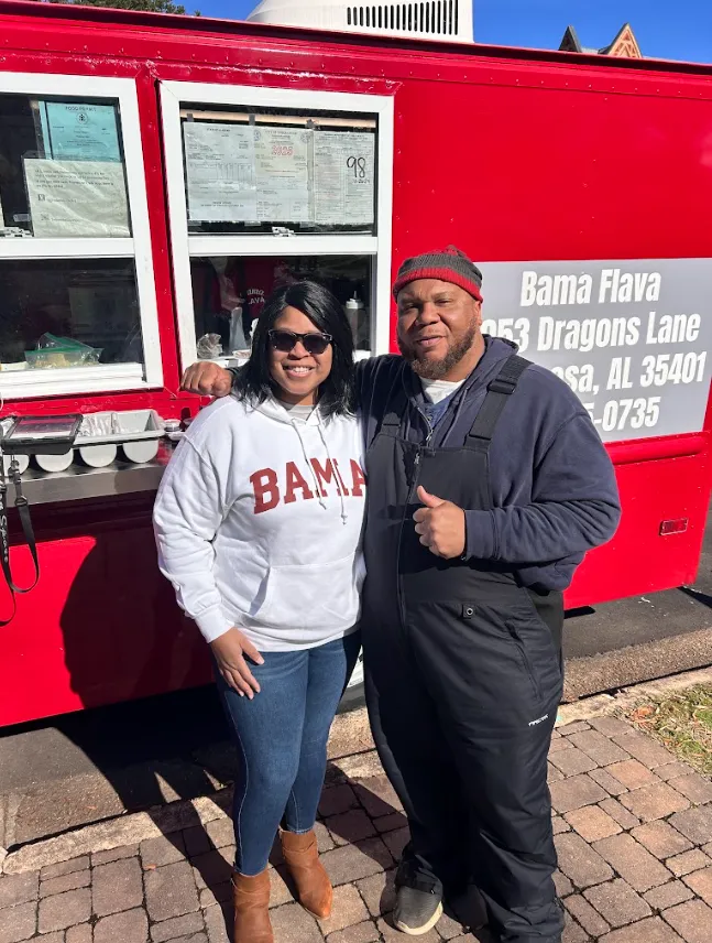 red motorcycle parked beside yellow post