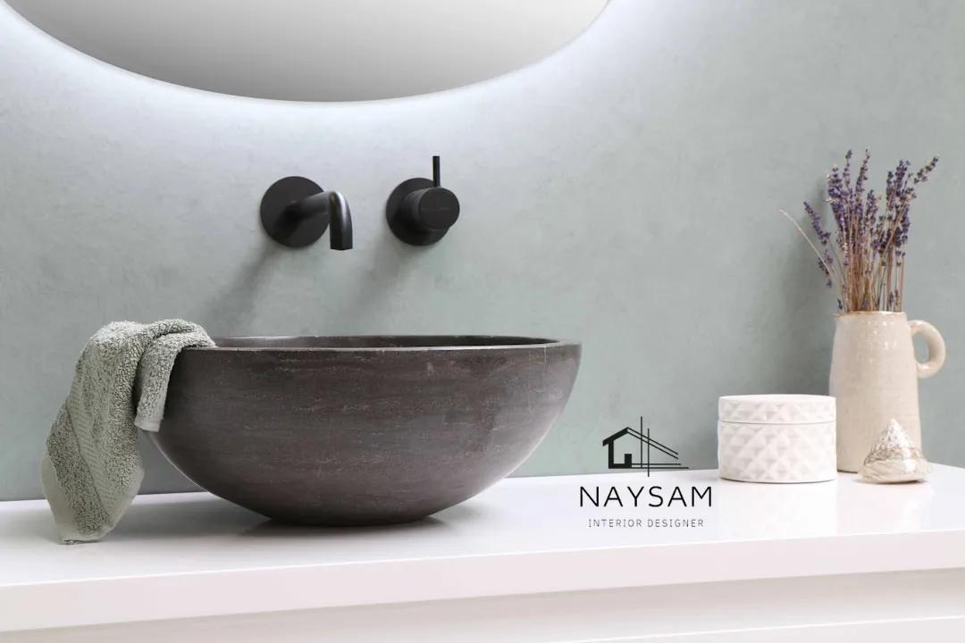 white ceramic bowl on white wooden table