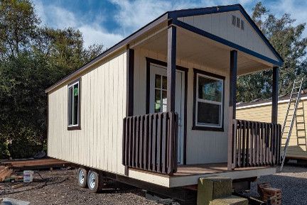 A close up of two light bulbs on a table