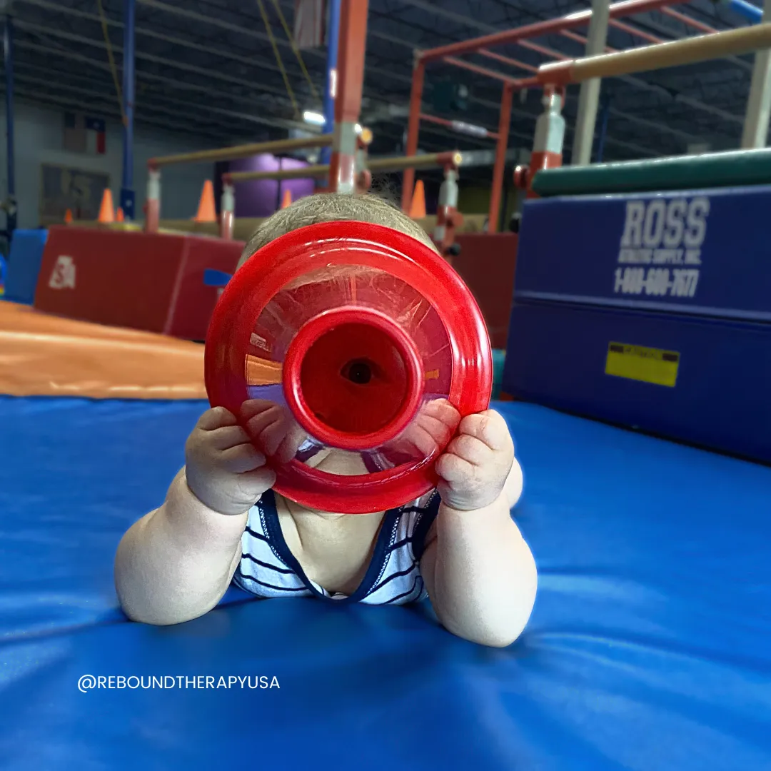 Adaptive gymnastics and trampoline therapy in Fort Worth, tailored for kids with special needs to thrive through play-based therapy and movement.