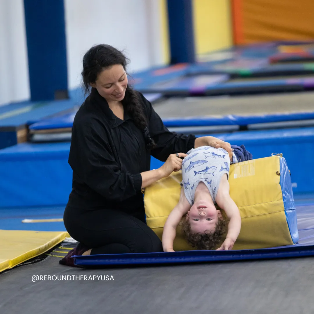 Adaptive gymnastics and trampoline therapy in Fort Worth, tailored for kids with special needs to thrive through play-based therapy and movement.