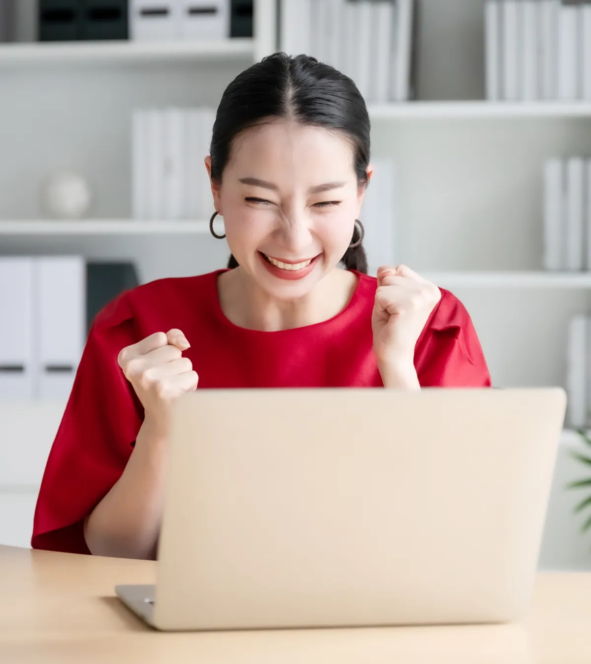 Coach celebrating new client bookings from funnel setup