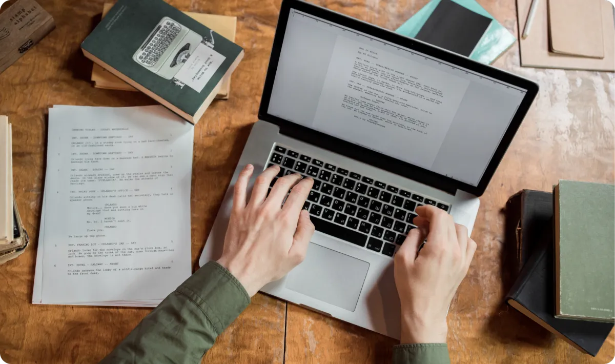 Person writing marketing copy for a landing page on a laptop
