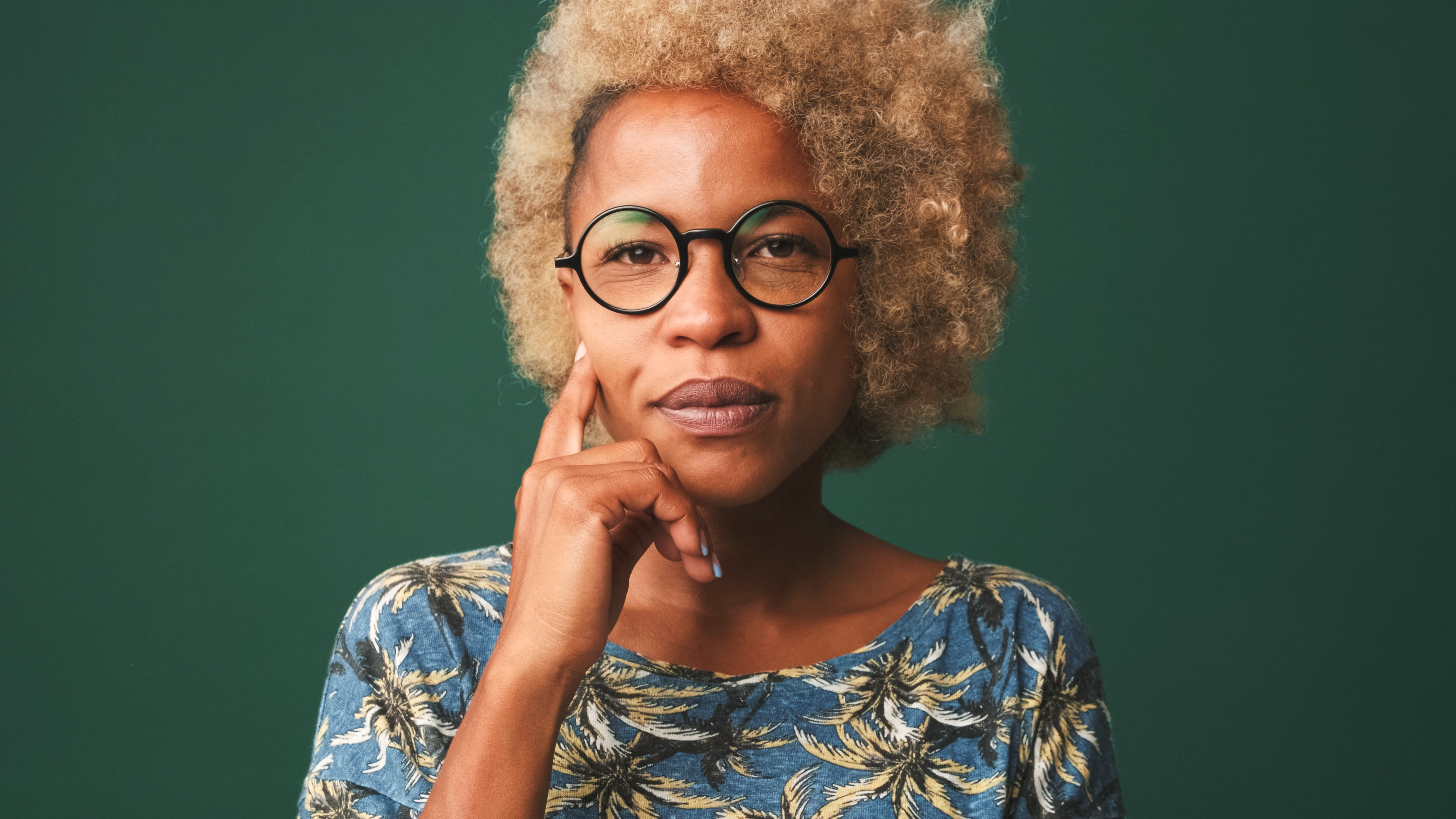 Thoughtful woman contemplating family caregiving responsibilities